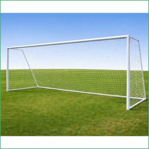 Soccer goal on a green field beneath a clear blue sky, empty and ready for play.