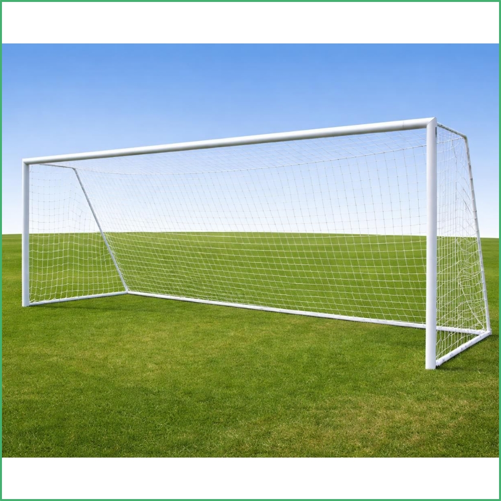 Synsport sports equipment - mid-size Soccer goal Aluminium | Synsport Soccer goal on a green field beneath a clear blue sky, empty and ready for play.